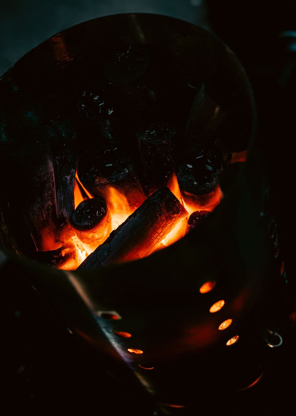 Charcoal glowing in the grill