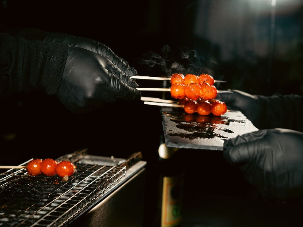 Cherry tomatoes served from the grill